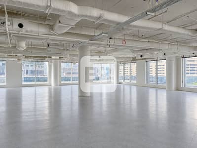 Office in affitto a Downtown Dubai, Dubai - Пустой индустриальный офис с городским видом. png