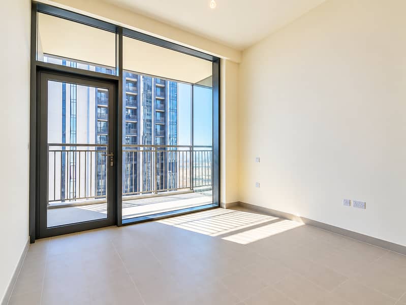 19 Sunlit Minimalist High-Rise Apartment Interior. png