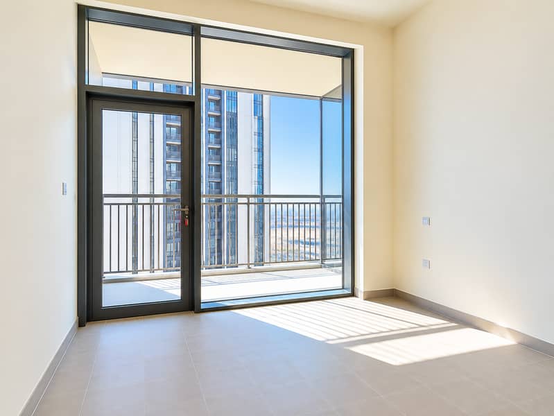 21 Sunlit Modern Room with Balcony Views. png
