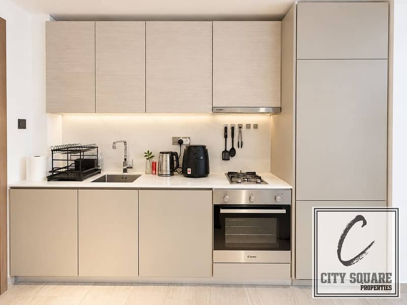 6 resize_Minimalist Beige Kitchenette with Built-In Appliances. jpg