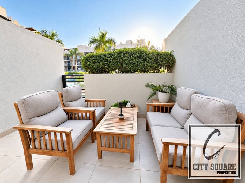 9 resize_Modern Patio Lounge with Lush Greenery. jpg
