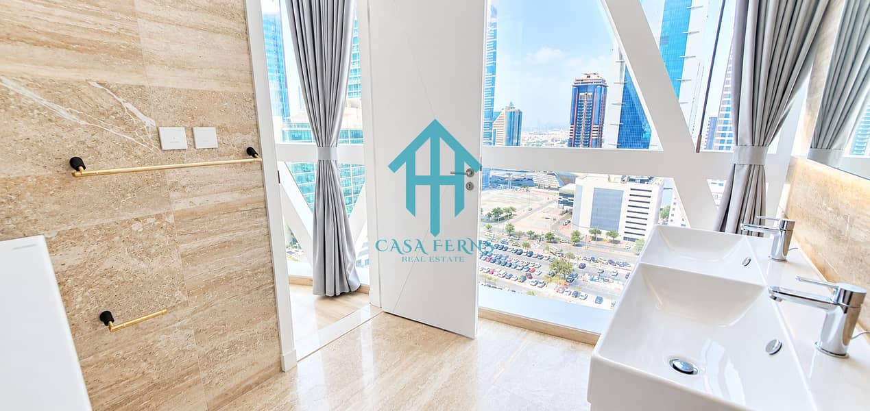 11 Luxury Bathroom with Panoramic City Views. png