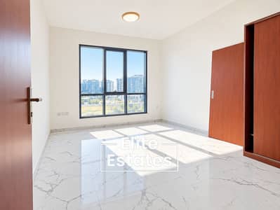 شقة 1 غرفة نوم للايجار في أرجان، دبي - Bright Minimalist Bedroom with City View. png