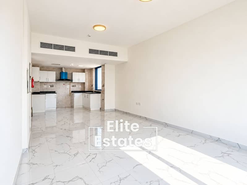 2 Bright Minimalist Open-Plan Kitchen Interior. png