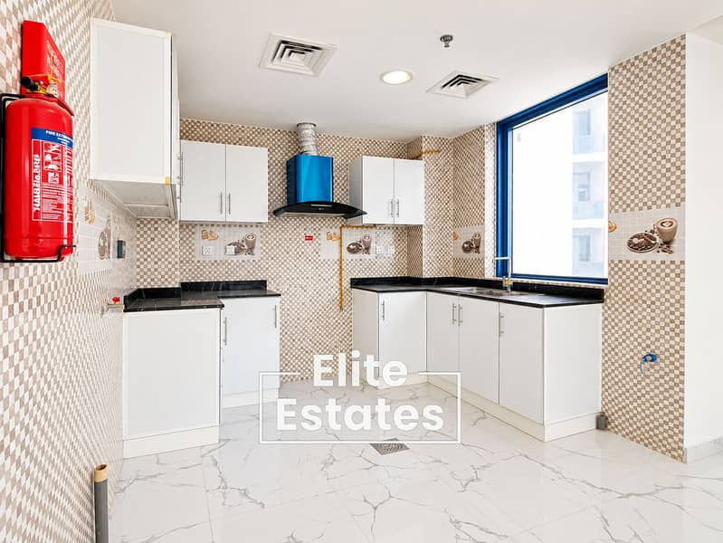 7 Bright Modern U-Shaped Kitchen Interior. png