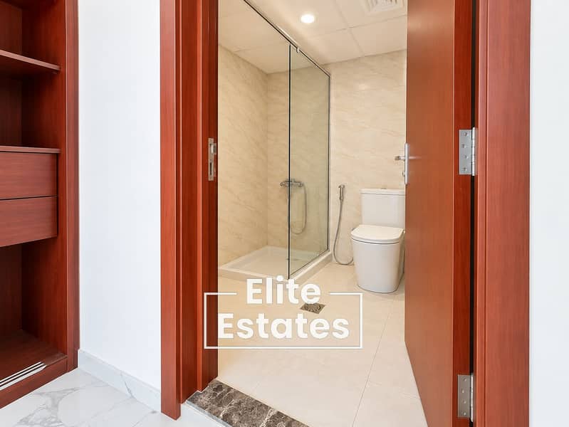 8 Modern Bathroom Through Wooden Door. png