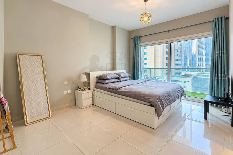 2 Modern Bedroom with City Views. png