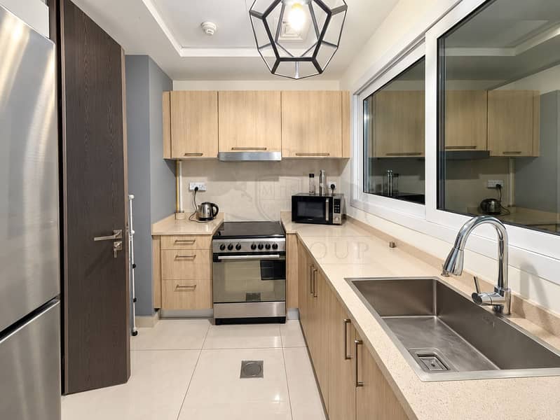 4 Modern Galley Kitchen with Geometric Pendant. png