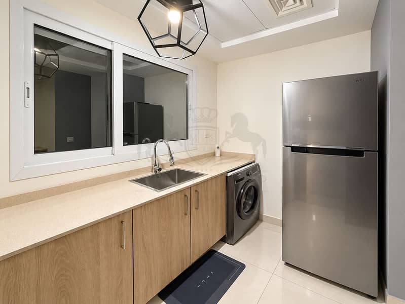 5 Bright Modern Kitchen-Laundry Interior. png