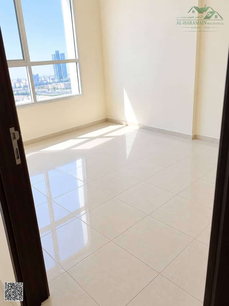 5 Sunlit Empty Room with City View. jpg