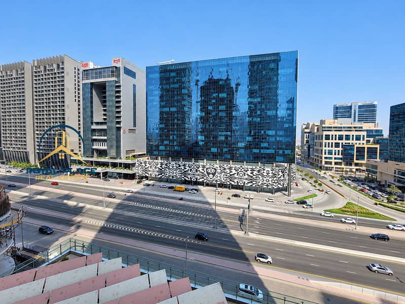 9 Modern blue glass building streetscape. png