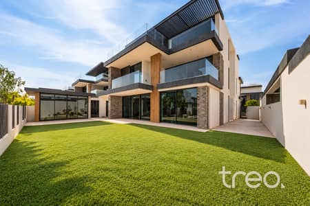 فیلا 5 غرف نوم للبيع في تلال الغاف، دبي - Modern Villa with Minimalist Lawn. png