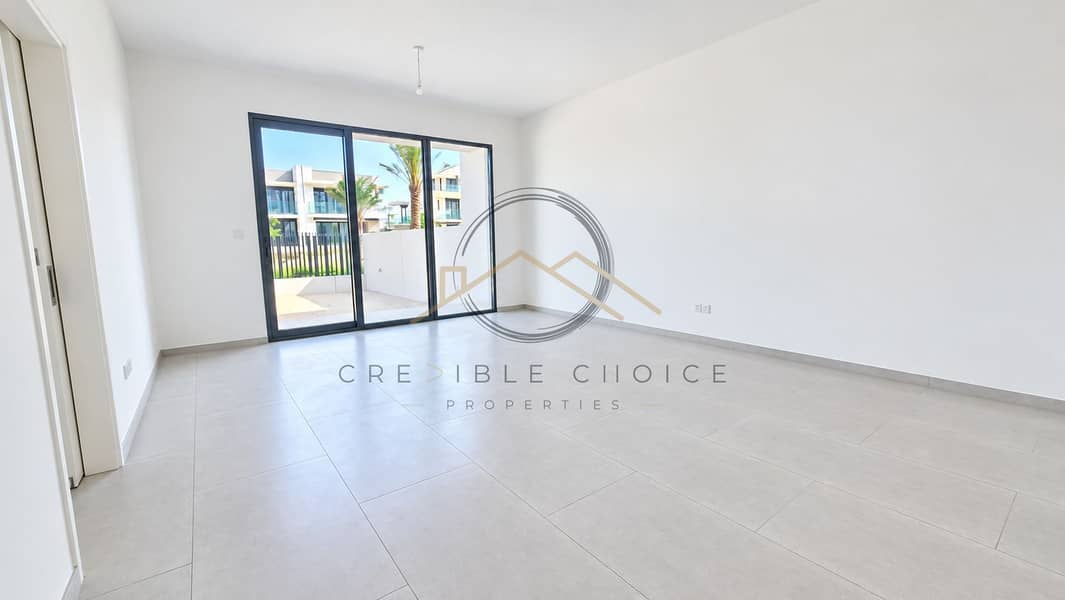 3 Bright Empty Apartment with Patio Views. png