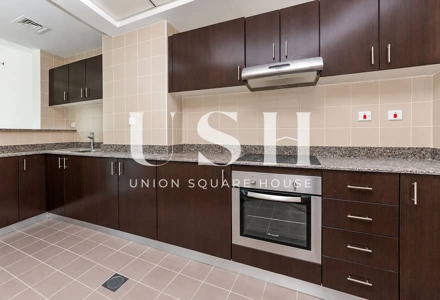 5 Modern Espresso Kitchen Interior. png