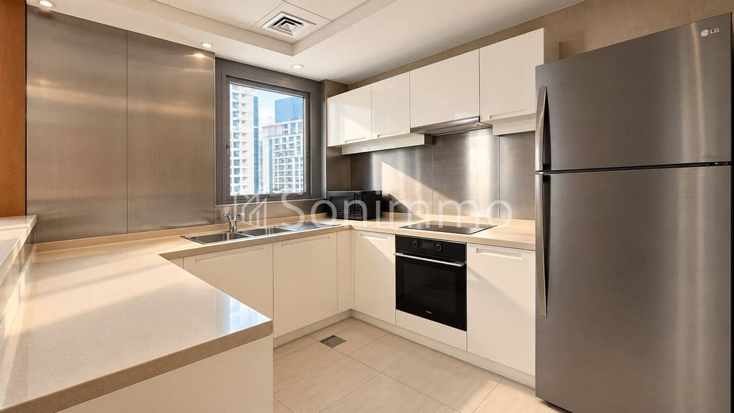 12 Modern Minimalist Kitchen with City Views. png