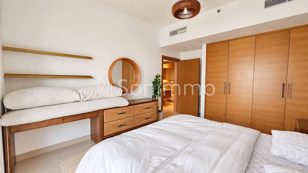21 Warm Minimalist Bedroom with Ensuite. png