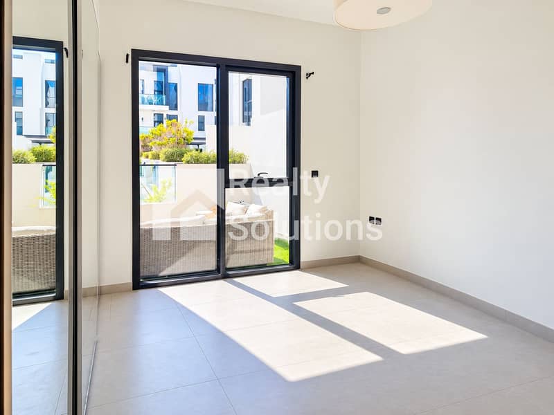 10 Sunlit Minimalist Room with Patio View (1). png