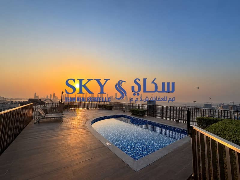 10 Rooftop Pool Sunset Over City Skyline. png
