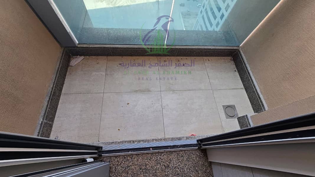9 apartment-for-rent-2-bedroom-alkhan-alsharqh-balcony-04. jpg