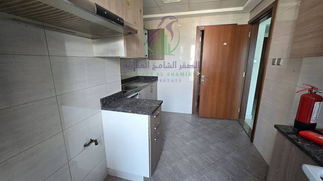 11 apartment-for-rent-2-bedroom-alkhan-alsharqh-kitchen-13. jpg
