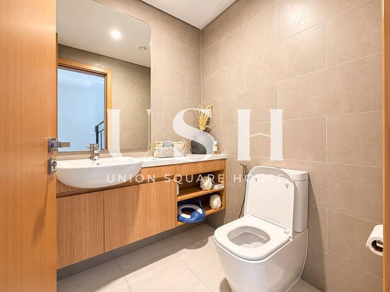 11 Warm Modern Powder Room Vanity. png