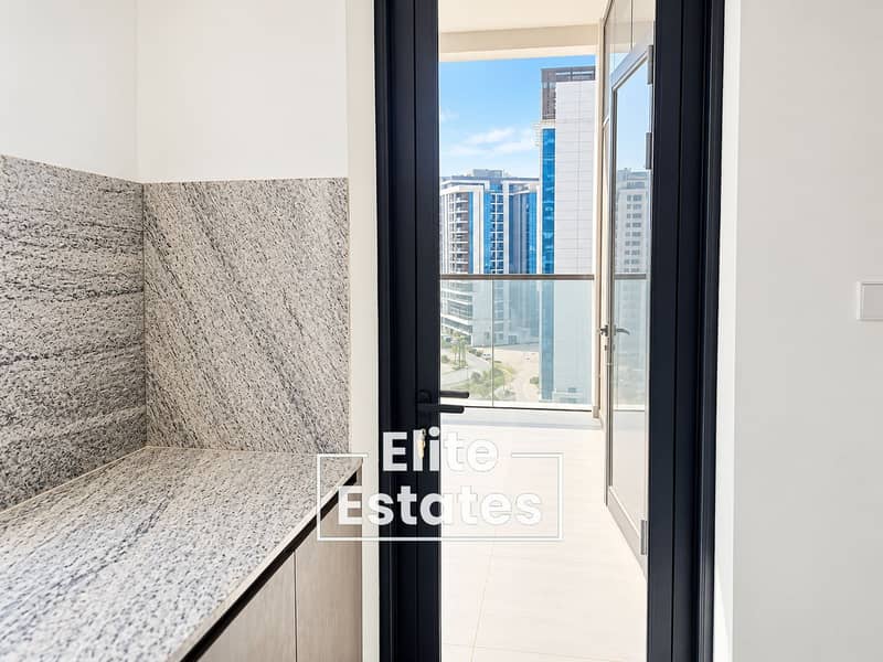 8 Modern Kitchen Corner with City Balcony. png