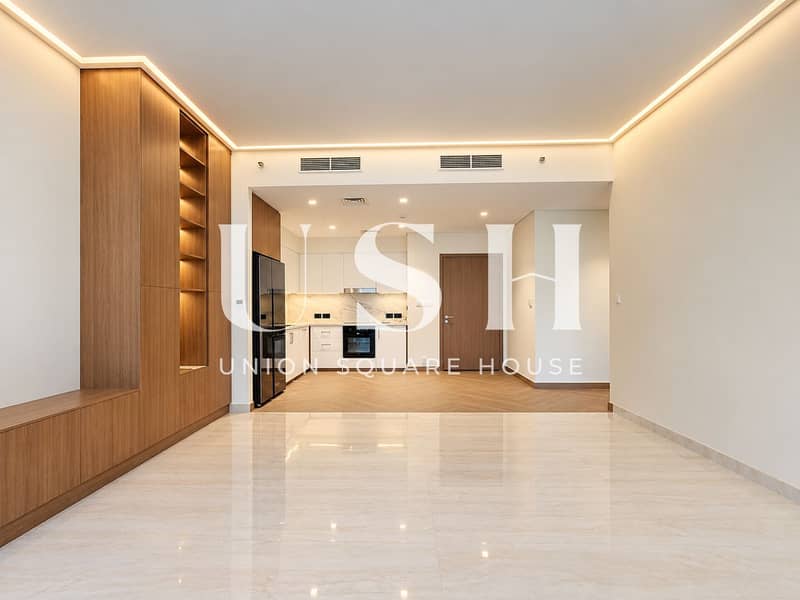2 Modern Warm-Toned Open-Plan Apartment. png
