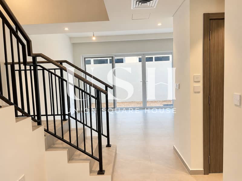 2 Modern Minimalist Hallway with Glass Doors. png