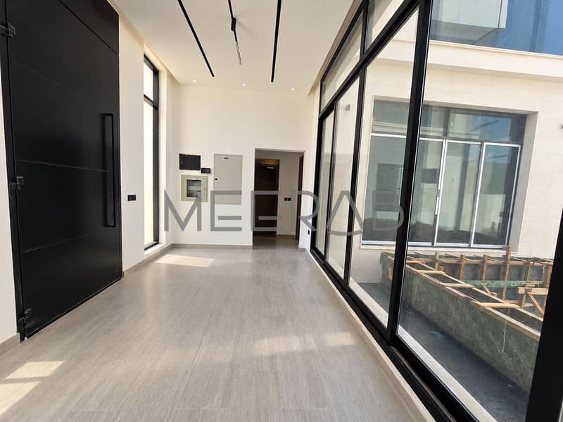 3 Minimalist Daylit Corridor with Glass Walls. png