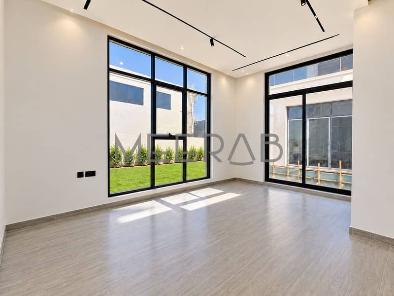 6 Sunlit Modern Room with Garden Views. png