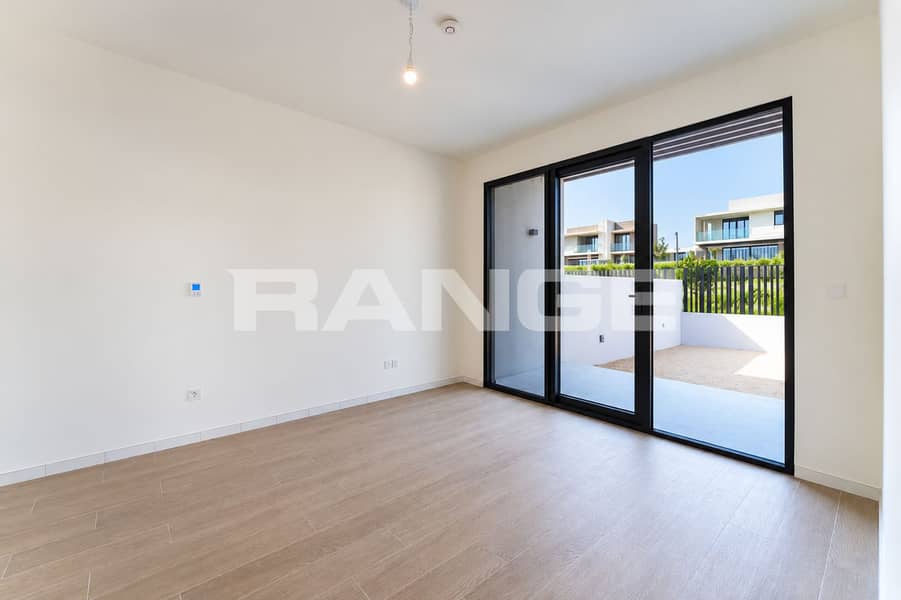 8 Bright Minimalist Room with Patio Views. png