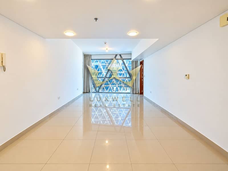 3 Symmetrical Minimalist Interior with Geometric Window. png