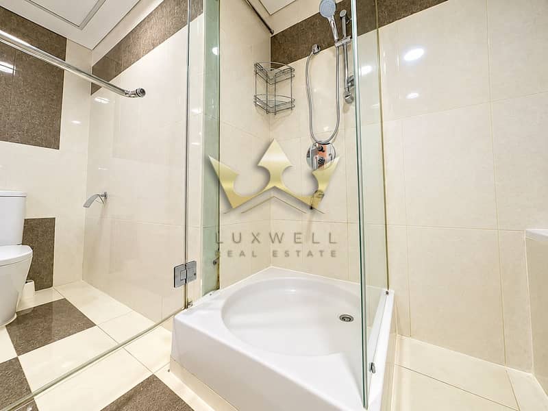 9 Modern Glass-Enclosed Bathroom Retreat. png