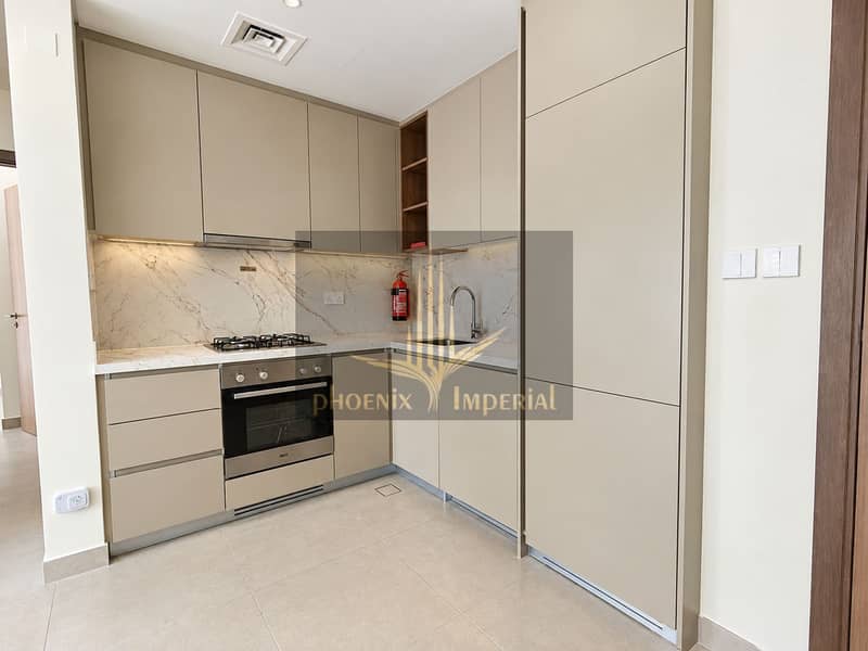 3 Minimalist Taupe Marble Kitchen. png