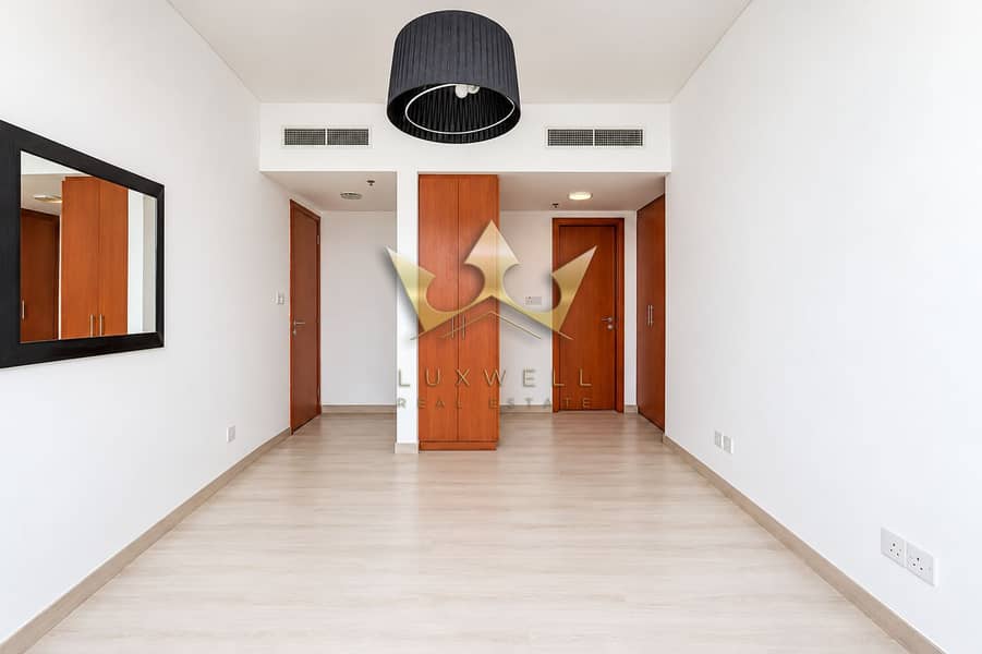 3 Minimalist Modern Hallway with Warm Wood Accents. png