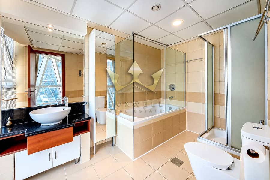 4 Bright Modern Beige-Tiled Bathroom. png