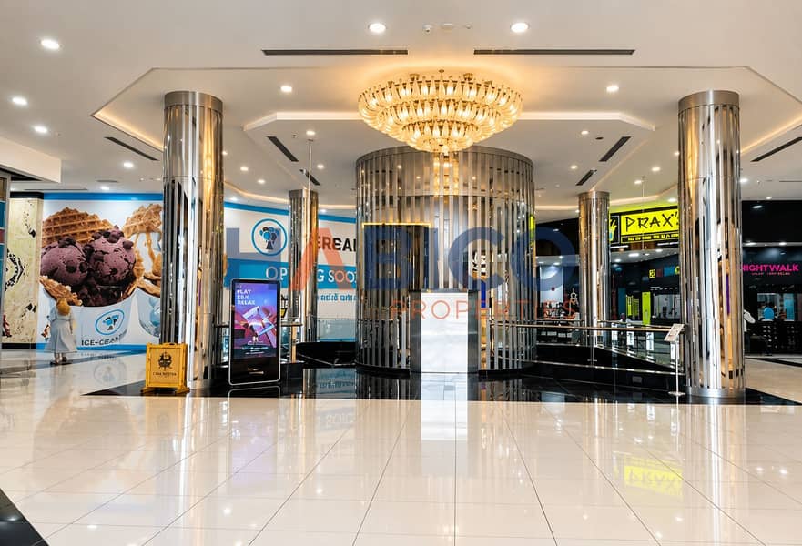 6 Luxury Mall Lobby with Chandelier and Ice-Cream Mural. png