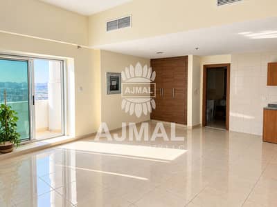 استوديو  للايجار في مجمع دبي لاند ريزيدنس (DLRC)، دبي - Sunlit Modern Apartment Interior. png