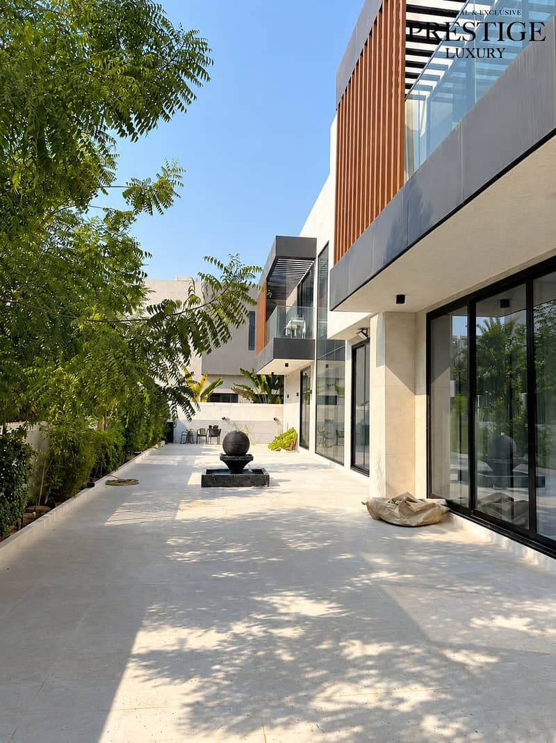 3 Modern Courtyard with Sculptural Fountain. png