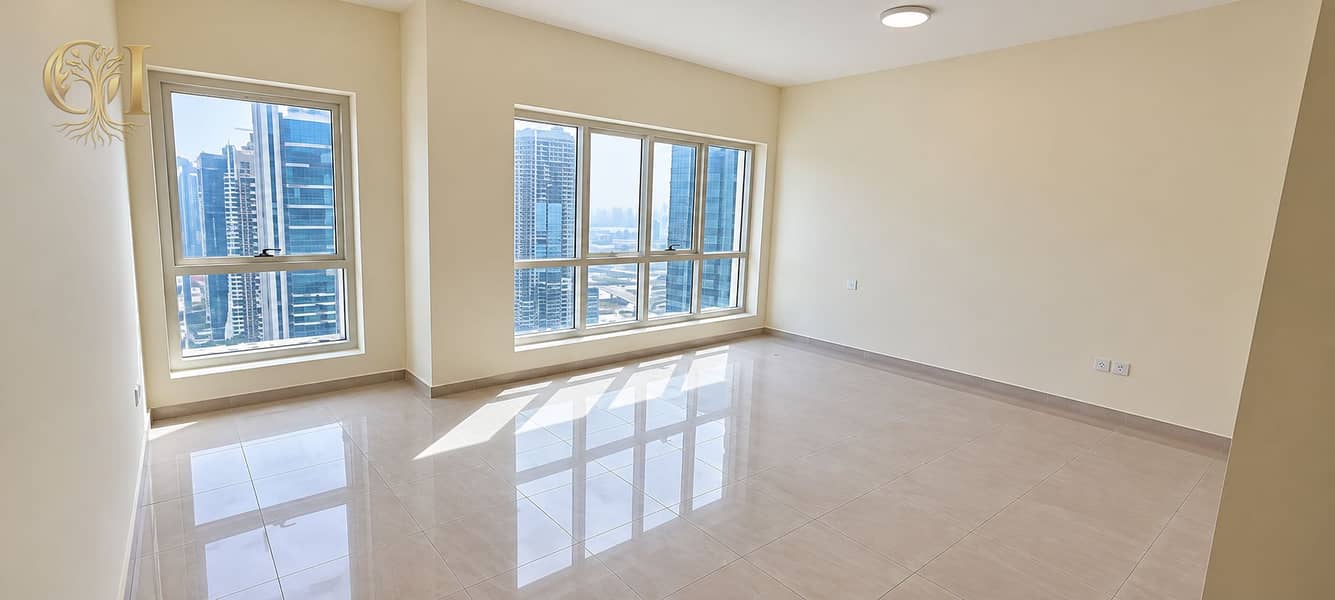 5 Sunlit Empty Apartment with City Views. png
