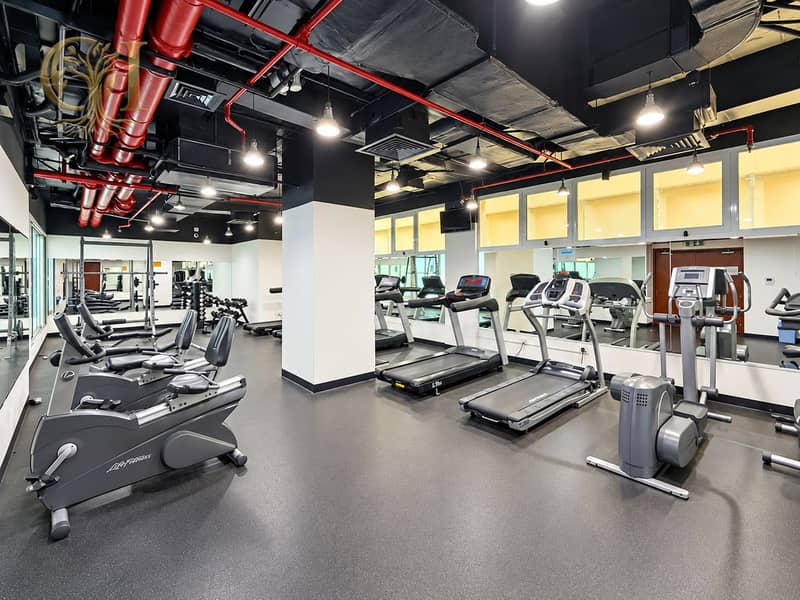9 Modern Gym Interior with Cardio Equipment. png