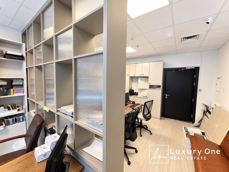 3 Modern Office Studio with Shelving Divider. png