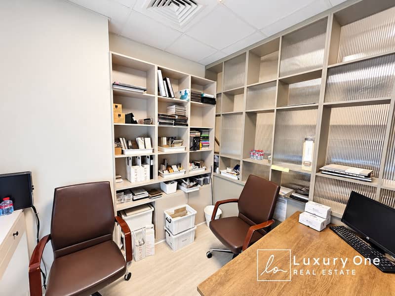 7 Modern Design Studio with Organized Sample Shelves (1). png
