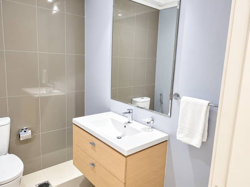 9 Modern Greige-Tile Bathroom Vanity. png