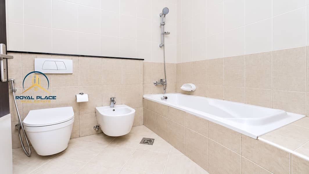 11 Bright Modern Tiled Bathroom Interior. png