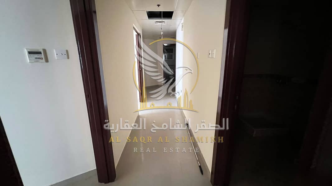 11 غرفة-وصالة-للا-يجار-2-غرف-البوطينة-الشارقة-صورة-العقار-yt-001-14. jpg