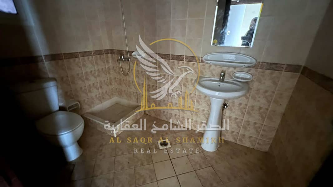 14 غرفة-وصالة-للا-يجار-2-غرف-البوطينة-الشارقة-صورة-العقار-yt-001-09. jpg