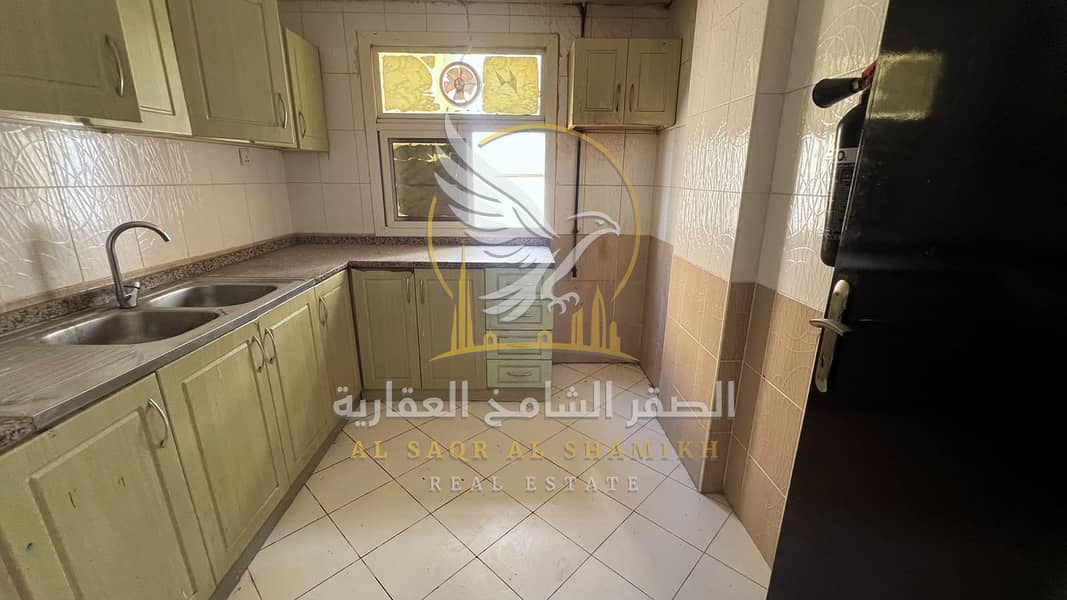 11 غرفة-وصالة-للا-يجار-1-غرف-البوطينة-الشارقة-صورة-العقار-yt-001-05. jpg