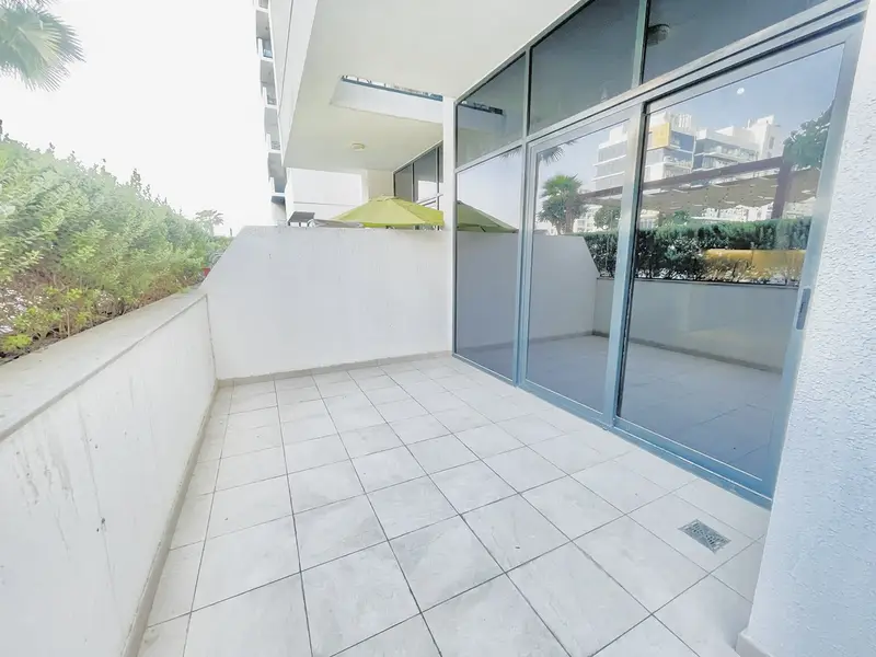 SPACIOUS 3-BEDROOM APARTMENT | HUGE TERRACE | 1,111 SQFT | AED 125K | AZIZI RIVIERA 4