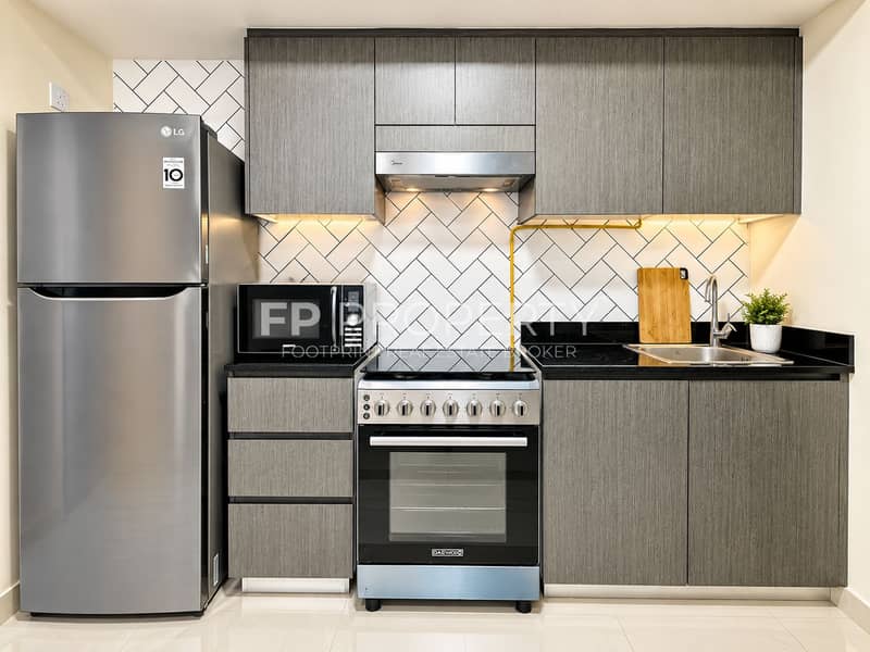 6 Modern Grey Kitchen with Warm Lighting. png